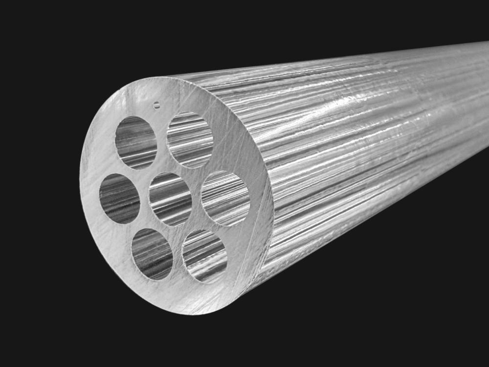 MCF（マルチコアファイバ ）クラッドプリフォーム。OFC 2026 出展予定製品